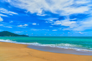 Fototapeta na wymiar Beach and sea wave reaching coastal with soft light tropical paradise landscape. Beautiful scene of white beach turquoise ocean wave. Summer Concept.
