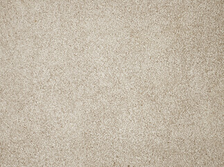 Fototapeta na wymiar Beige sand wash texture background. Washed small sandstone of wall and floor