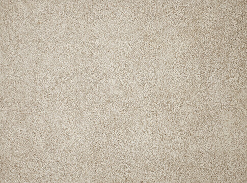 Beige sand wash texture background. Washed small sandstone of wall and floor