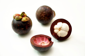 Mangosteen fruit isolated on white background, selective focus