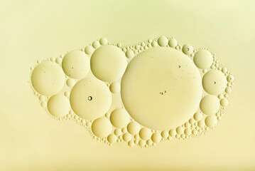 Decorative abstract pattern of a cluster of cream-colored bubbles