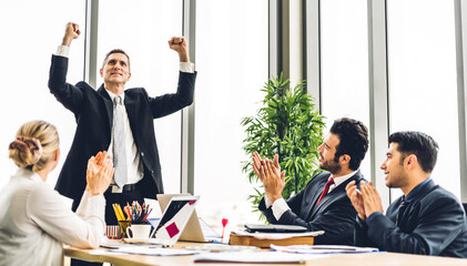 Group of professional business meeting and discussing strategy with new startup project.Creative business people planning and brainstorm with laptop computer in modern office.Teamwork concept