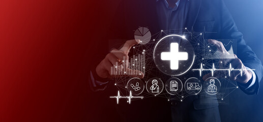 Businessman hold virtual plus medical network connection icons. Covid-19 pandemic develop people awareness and spread attention on their healthcare.Doctor,document,medicine,ambulance,patient icon.