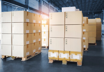 Packaging Boxes Stacked on Pallets Rack in Storage Warehouse. Cartons Package Boxes. Supply Chain Shipment. Storehouse Shipping Warehouse Logistics.