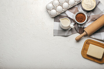 Ingredients for preparing bakery and utensils on light background