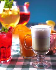 Butterfly-pea flower tea or Blue Tea, Cocktail set, summer drinks over blue background.