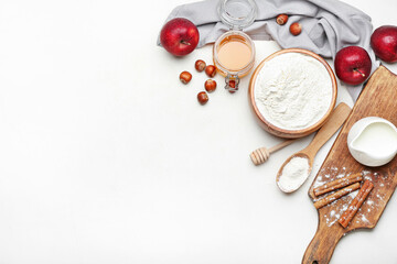 Ingredients for preparing bakery, apple and nuts on light background