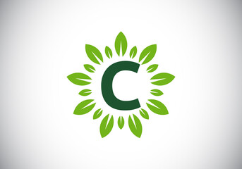 Initial C monogram letter alphabet with leaf wreath. Green leaf, flower logo design concept. Modern vector logo design for business, and company identity.