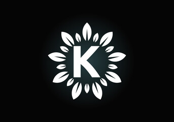 Initial K monogram letter alphabet with leaf wreath. Green leaf, flower logo design concept. Modern vector logo design for business, and company identity.