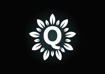 Initial Q monogram letter alphabet with leaf wreath. Green leaf, flower logo design concept. Modern vector logo design for business, and company identity.