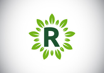 Initial R monogram letter alphabet with leaf wreath. Green leaf, flower logo design concept. Modern vector logo design for business, and company identity.