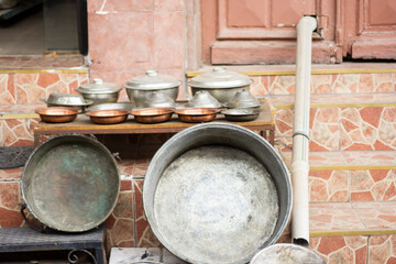 handmade antique copper cauldrons, pots and dishes.