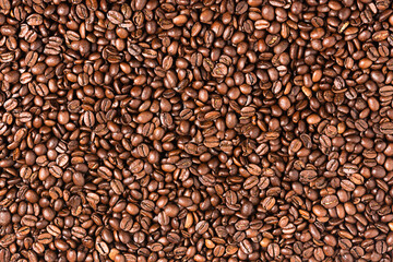 Roasted coffee beans background. Coffee beans texture.