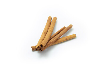 Top view of cinnamon sticks isolated on white