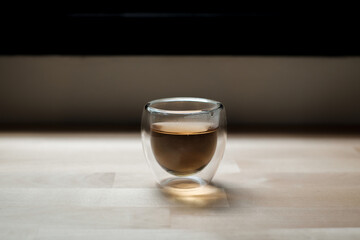 Drinking green and Japanese tea at home, hot tea cup on wood table
