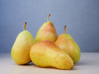 Green pear with a leaf isolated on white. Pear Clipping Path. Professional studio photo