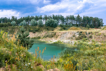 Gravel pit. A lake that fills the former pits with water.