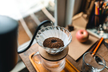 drip coffee in house,Pouring a hot water over a drip coffee