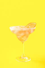 Glass of Hemingway daiquiri cocktail on color background