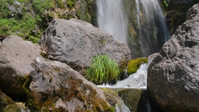 Beautiful Theth waterfall near Theth village in Albanian alps mountains