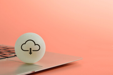 Laptop with cloud computing download symbol. Copy space - obrazy, fototapety, plakaty