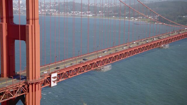 Spectacular closeup view of the popular San Francisco Golden Gate Bridge and cityscape in California