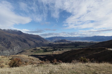 New Zealand Landscape with mountains, sky , water and trees