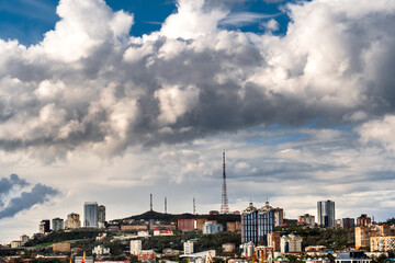 Obraz premium Clouds landscape over the city with blue sky
