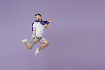 Fototapeta na wymiar Full size body length young brunet man 20s wear white t-shirt purple shirt jump like dancing keep eyes closed head aside isolated on pastel violet background studio portrait. People emotions concept.