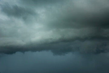 Close-up black strom clouds, Dark sky and dramatic rainy storm , Bad weather with precipitation in rainy season