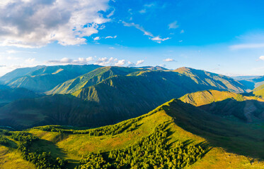 Fototapeta na wymiar Aerial View of mountain and green forest with grass in Kanas Scenic Area,Xinjiang,China.