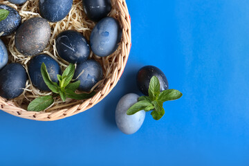 Decorated Easter eggs on background with place for text