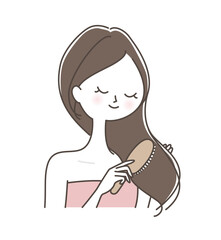 髪をブラシでとかす女性