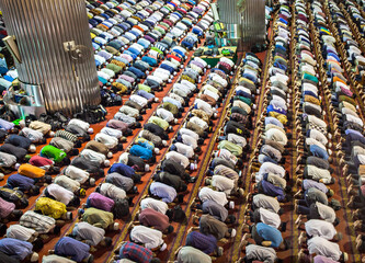 Muslim are Praying together in Istiqlal Mosque, The Biggest Mosque in South East Asia, Jakarta,...