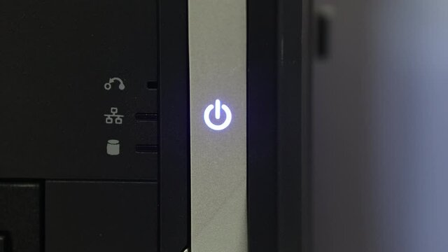 Close-up of high-performance desktop PC switch buttons and LEDs indicating operating status. Inside the PC computer case and the technology background concept.