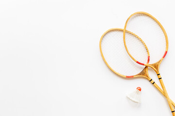 Two rackets and shuttlecock for playing badminton, top view