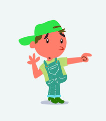 Surprised cartoon character of little boy on jeans points to something to his side.