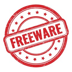 FREEWARE text on red grungy vintage round stamp.