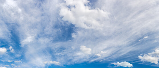 Blue sky with cirrus and cumulus clouds, panoramic view