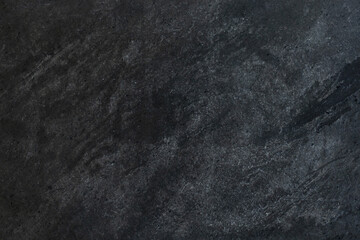 A black stone tile, textured for background