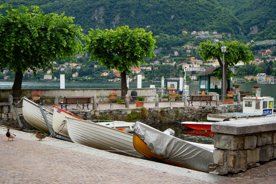 Small port Torno, Italy, at Lago di Como, with fish small fishing boats