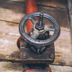 Industrial valve on a gas supply or heating system pipe. Selective Focus