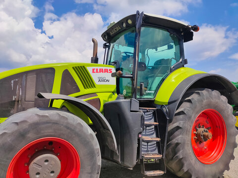 Kyiv, Ukraine - June 16, 2021 : New tractor CLAAS Axion 950 at Kyiv, Ukraine on June 16, 2021.