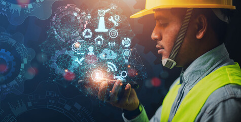 technology concept Intelligent Industry 4.0 engineers use industrial data network software as a driver.
