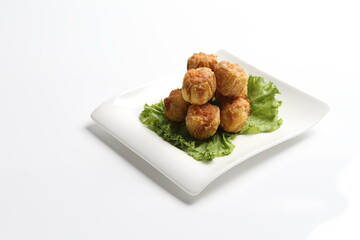 deep fried pork siew mai meat ball dim sum in white black background dim sum snack halal menu