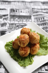 deep fried pork siew mai meat ball dim sum in white black background dim sum snack halal menu