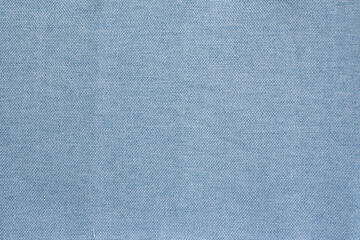 Fototapeta na wymiar Textured texture of blue curtain fabric with coarse thread