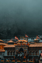 Moody photograph of Badrinath temple in Uttarakhand during monsoon season
