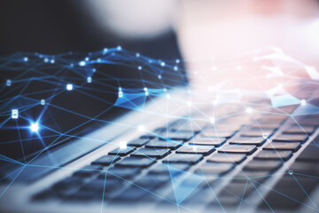 Close up of hands using noteboook with creative glowing polygonal mesh on blurry background. Innovation and technology concept. Double exposure. © Who is Danny