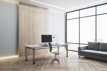 Naklejka na ściany i meble Desk with empty black computer monitor in modern white office interior with daylight, wooden flooring and city view. Mock up, 3D Rendering.